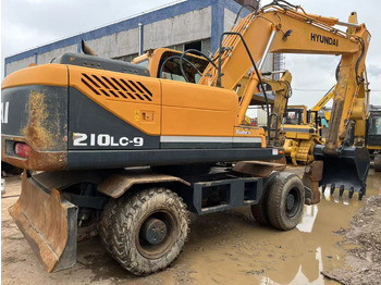 Excavadora de ruedas HYUNDAI R210